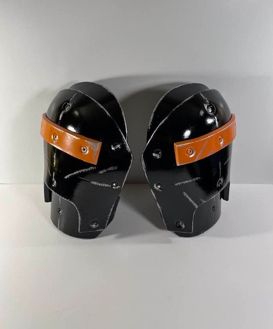 Deathstroke Arkham Origins deluxe shoulders. Matte Black and True Orange.
