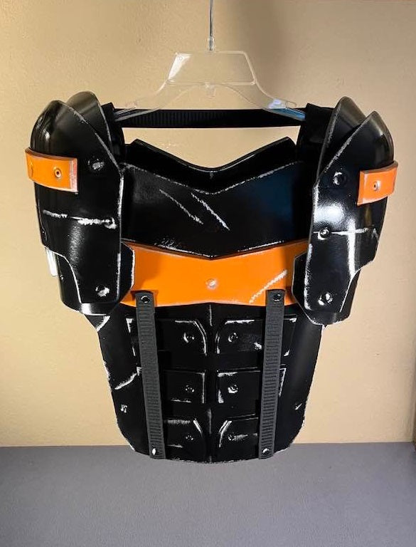 Deathstroke Arkham Origins deluxe shoulders. Matte Black and True Orange.